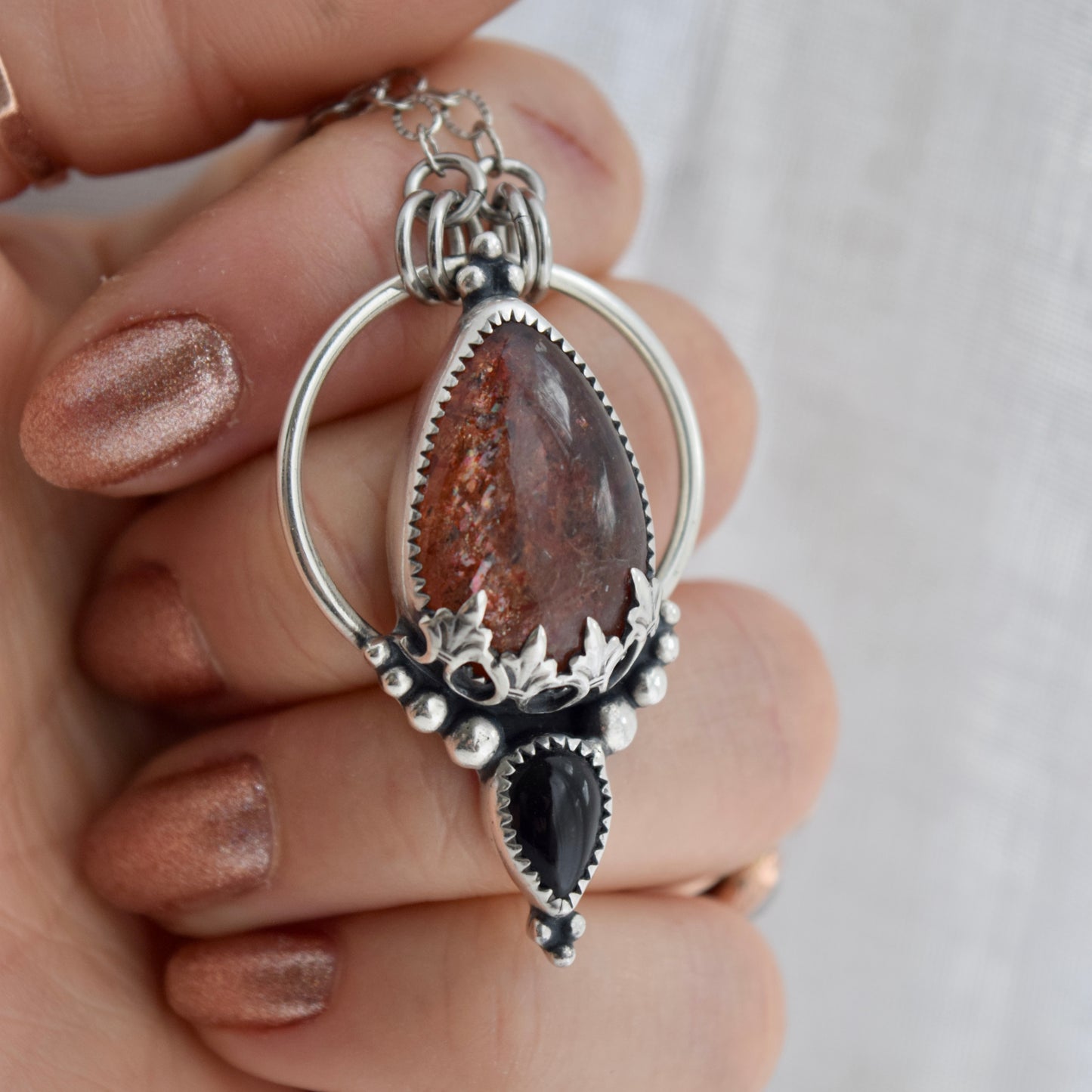Pendulum Pendant with Sunstone and Black Onyx