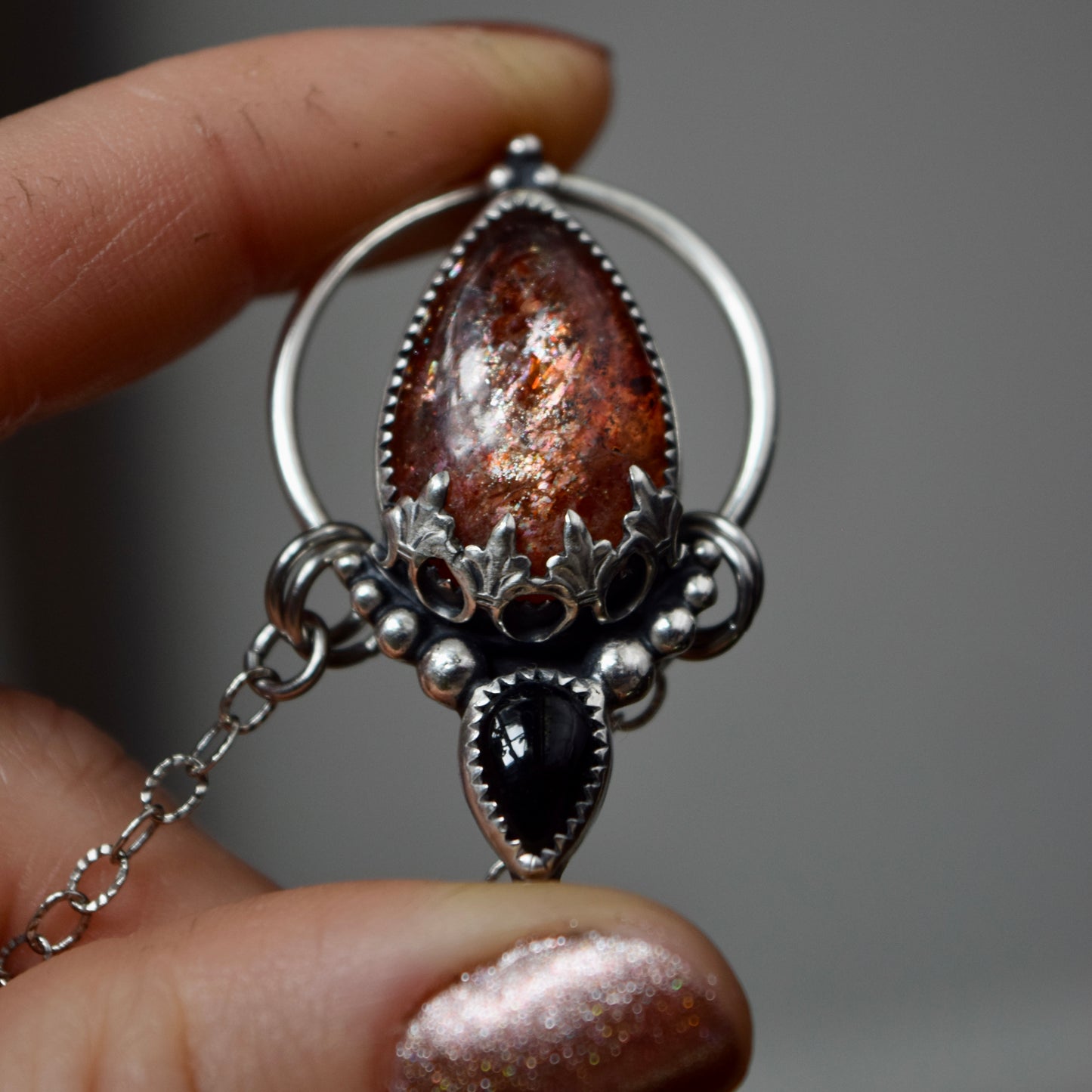 Pendulum Pendant with Sunstone and Black Onyx