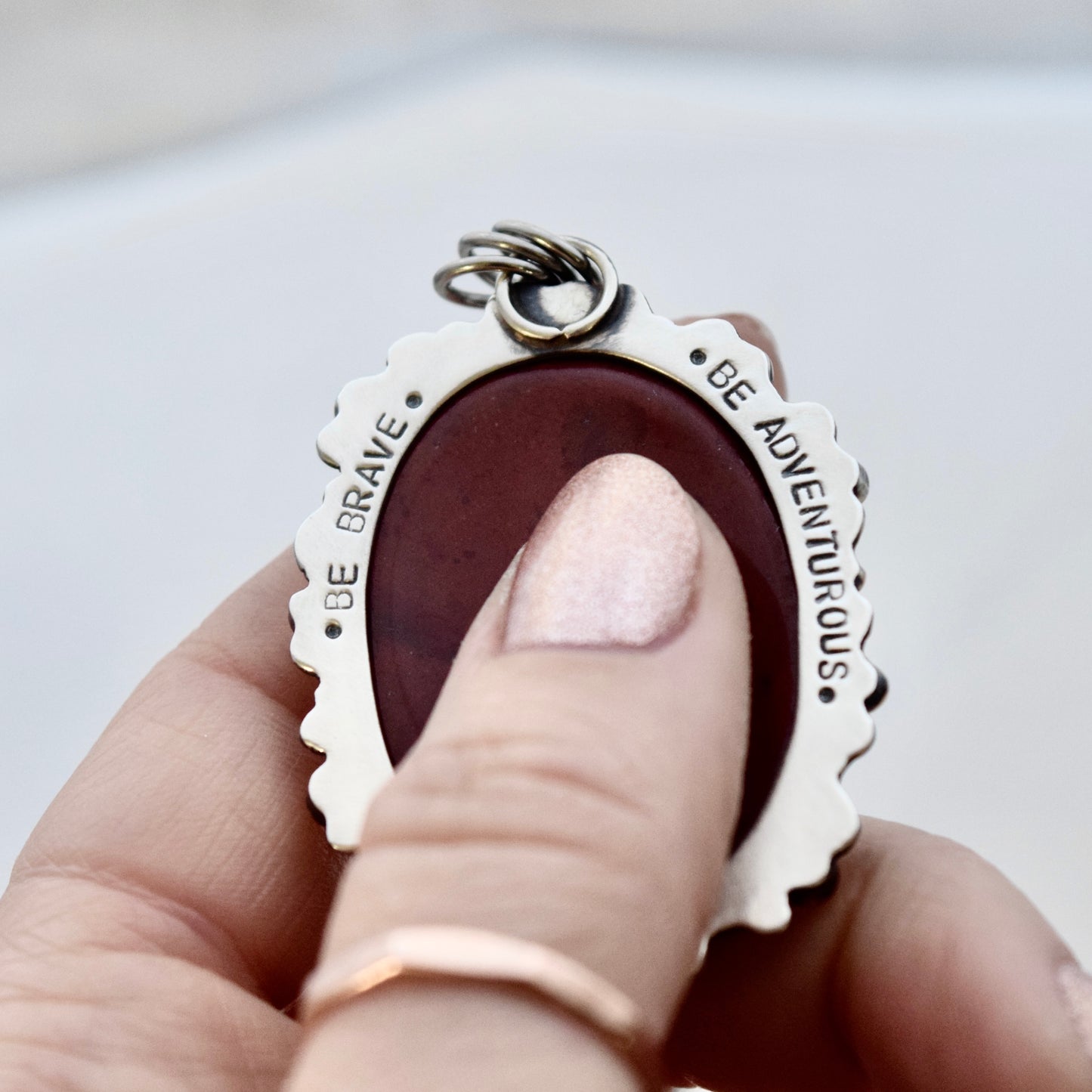 The Lion House Worry Stone Pendant with Red Jasper, Garnet, and Yellow Gold Fill