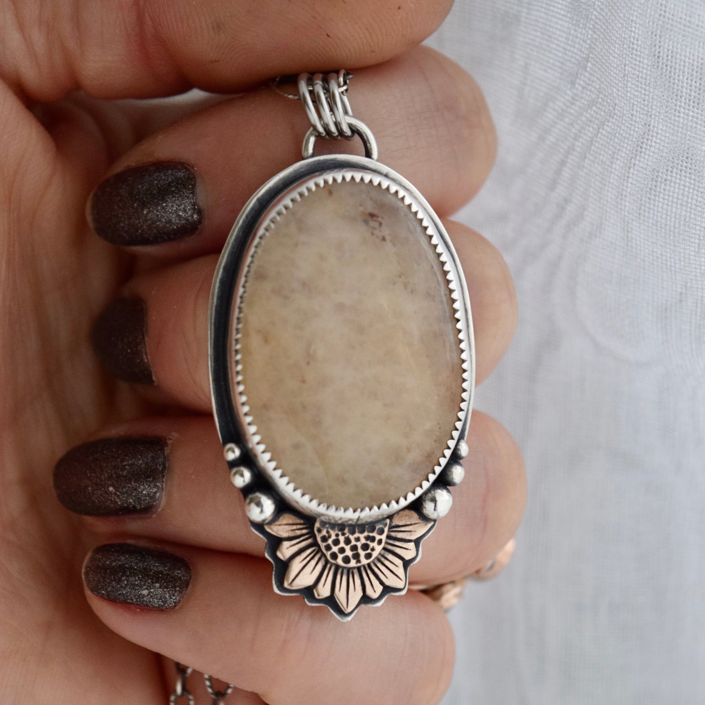 Turn Towards the Sun Worry Stone Pendant with Yellow Quartz and Bronze