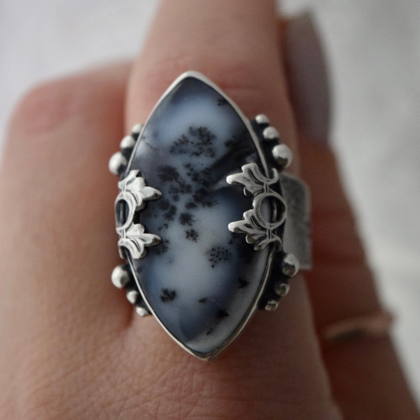 Paw Prints in the Snow Ring with Dendritic Opal size 7.5