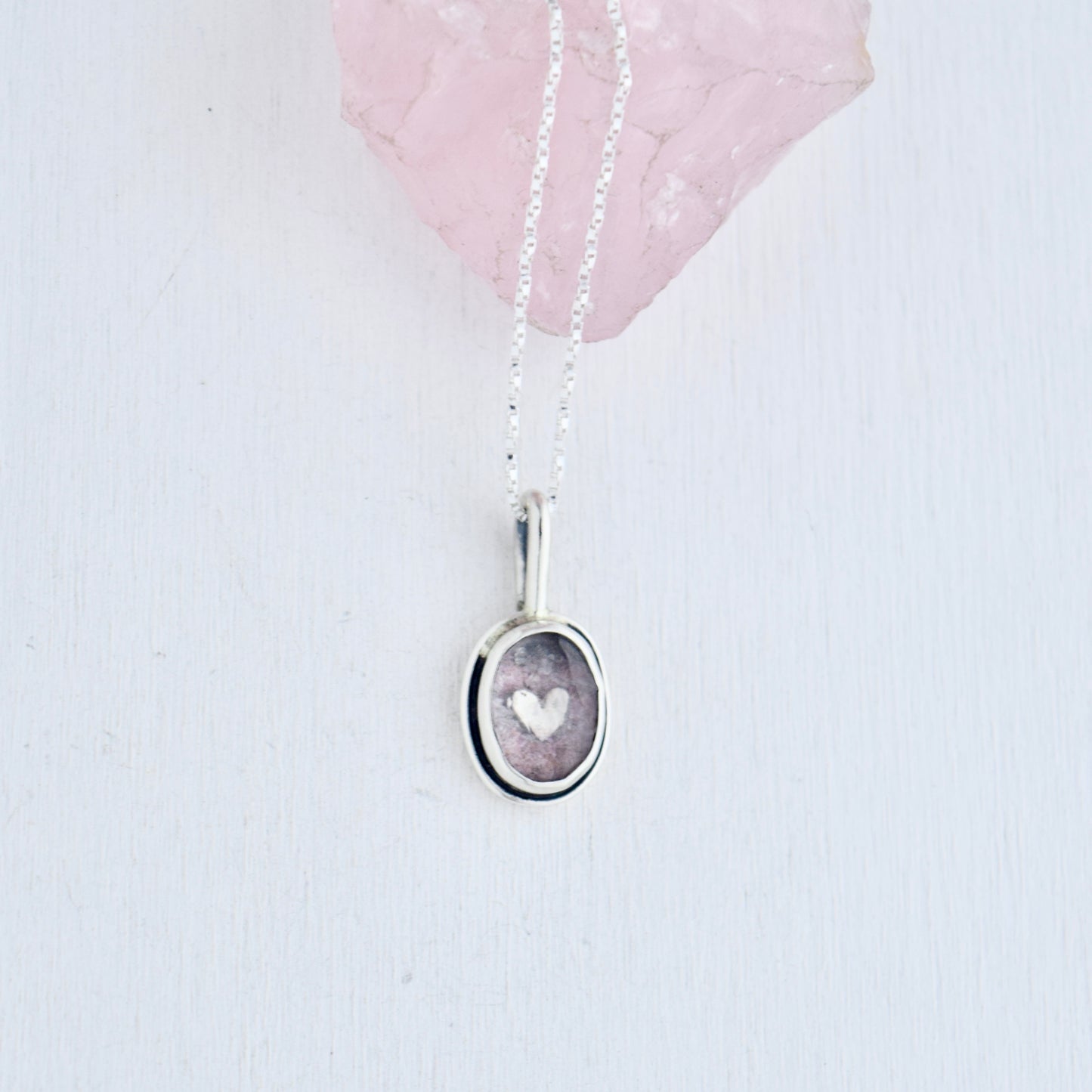 Encased Heart Necklace with Crushed Rose Quartz and Ruby set beneath Clear Quartz