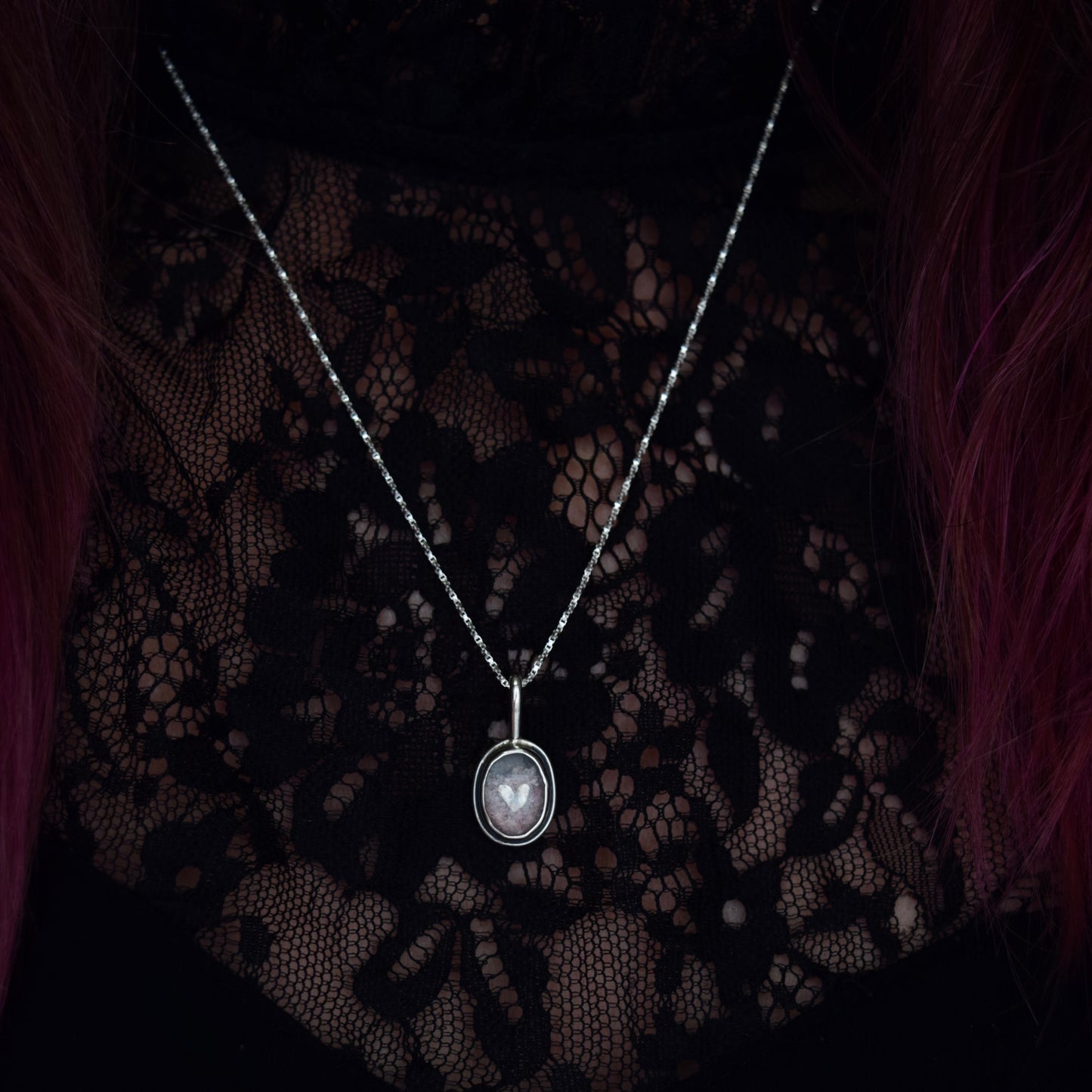 Encased Heart Necklace with Crushed Rose Quartz and Ruby set beneath Clear Quartz