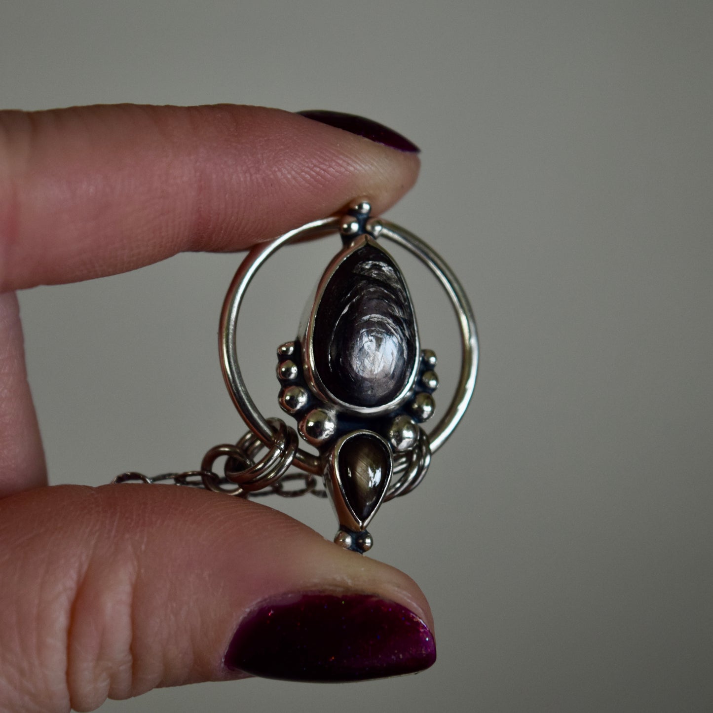 Pendulum Pendant with Hypersthene and Black Star Sapphire